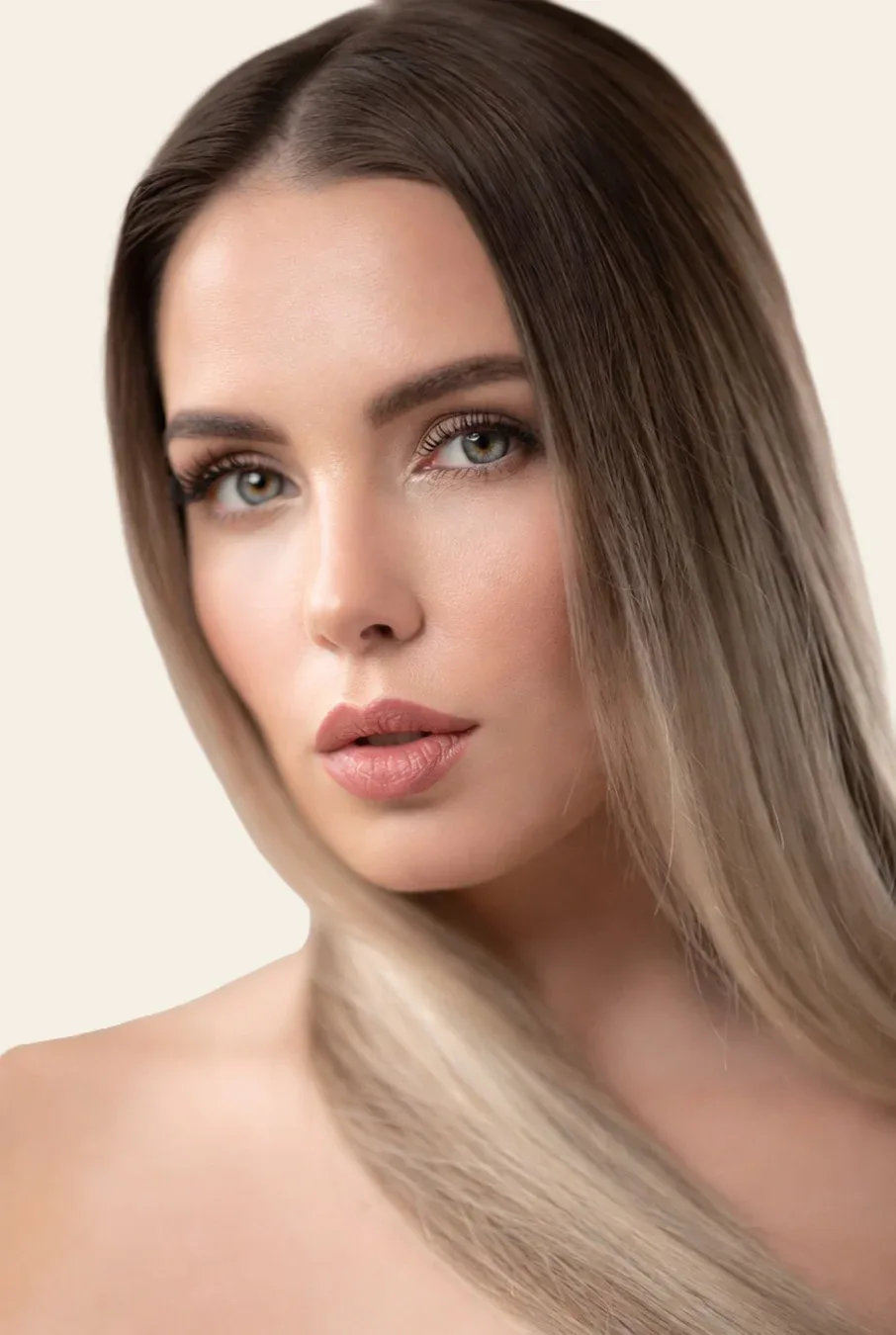 Dimensional blonde hair color with a soft shadow root, seamless blonde blend, and luminous shine at Box Office Hair in Winter Springs, Florida.