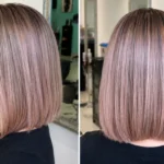 Rose gold blonde hair color with soft pastel dimension, a precision bob haircut, and luminous shine at Box Office Hair in Winter Springs, Florida.