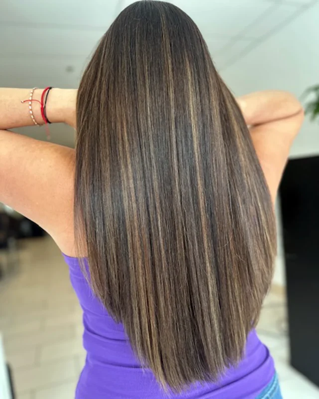 Luxury hair extensions creating fuller, thicker hair with seamless blending and natural-looking volume at Box Office Hair in Winter Springs, Florida.