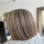 Smooth, healthy hair with dimensional shine, silky texture, and frizz-free finish after a professional hair treatment.