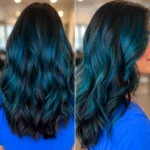 Teal blue fashion hair color balayage on dark hair with dimensional waves in Winter Springs Florida